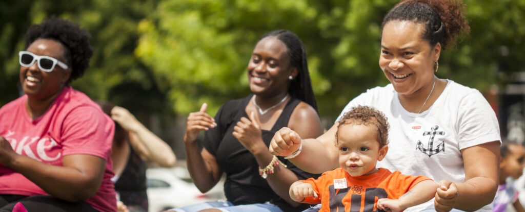 People smiling and being active outdoors